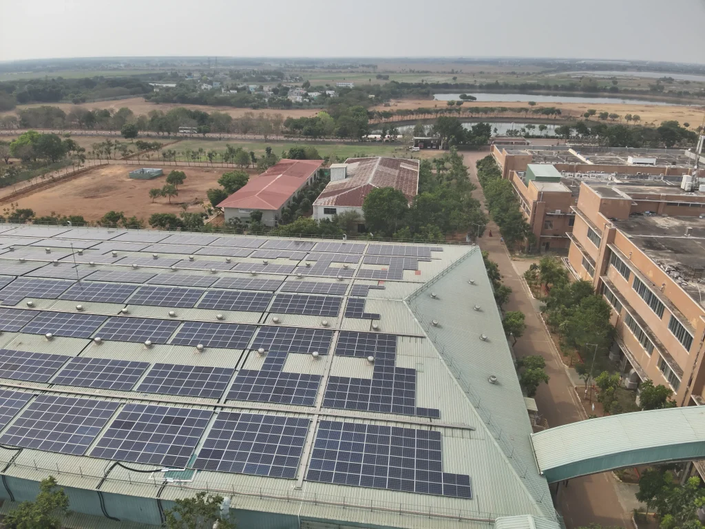 Aerial view of building rooftops showing space for installing solar panels.