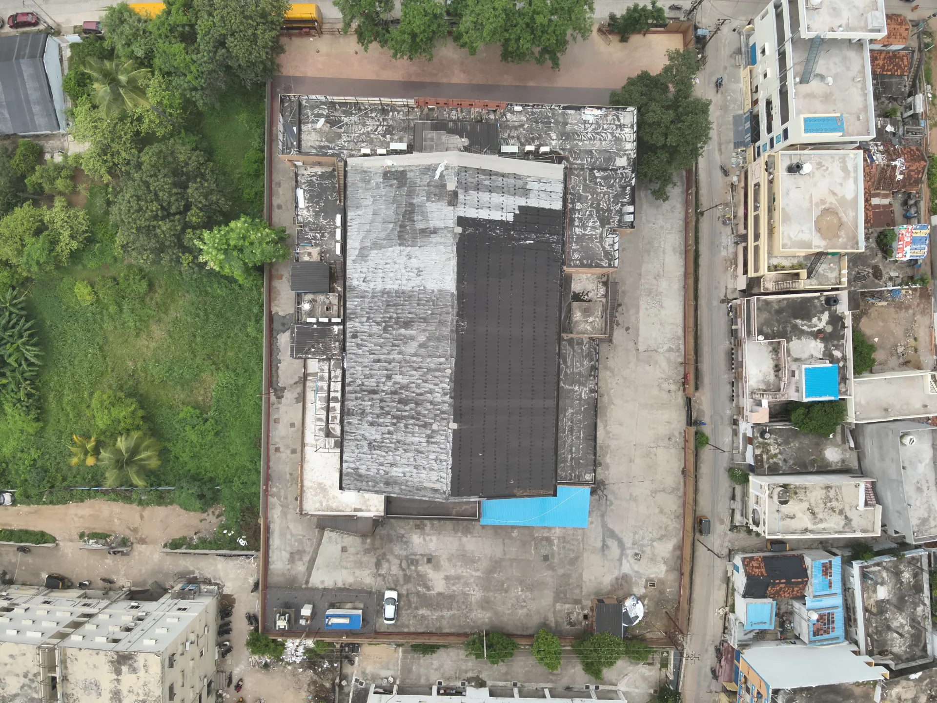 Rooftop solar panels being checked and cleaned during a yearly inspection.
