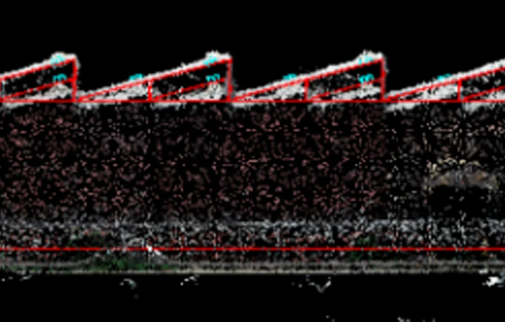 3D point cloud view of a rooftop with solar panels showing roof shape and layout.