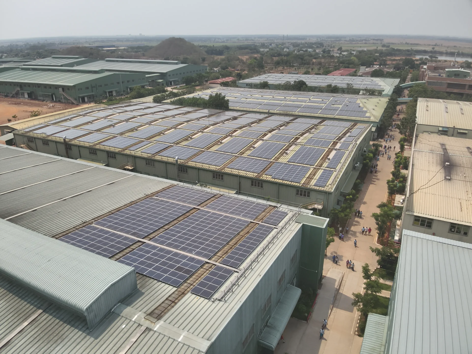 Drone inspecting solar rooftop panels to detect faults and hotspots