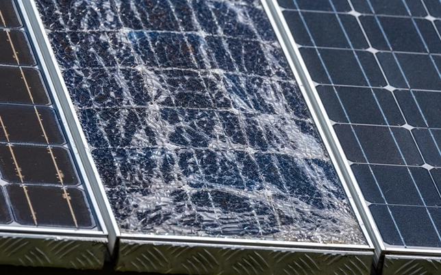 Damage in solar panel showing cracked glass and reduced energy efficiency