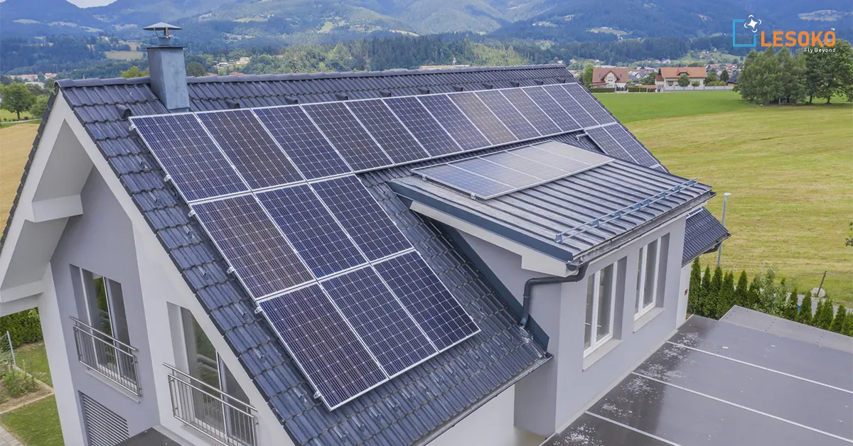 Drone flying over a house rooftop for solar panel survey and site inspection