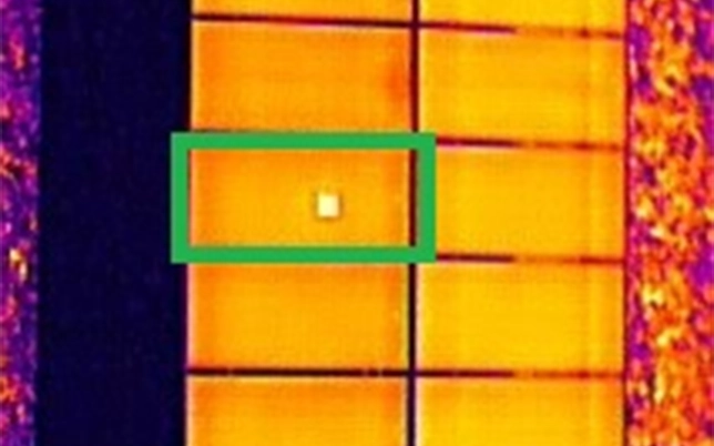 Hotspot detected in solar panel by drone thermal imaging inspection — critical fault requiring immediate maintenance