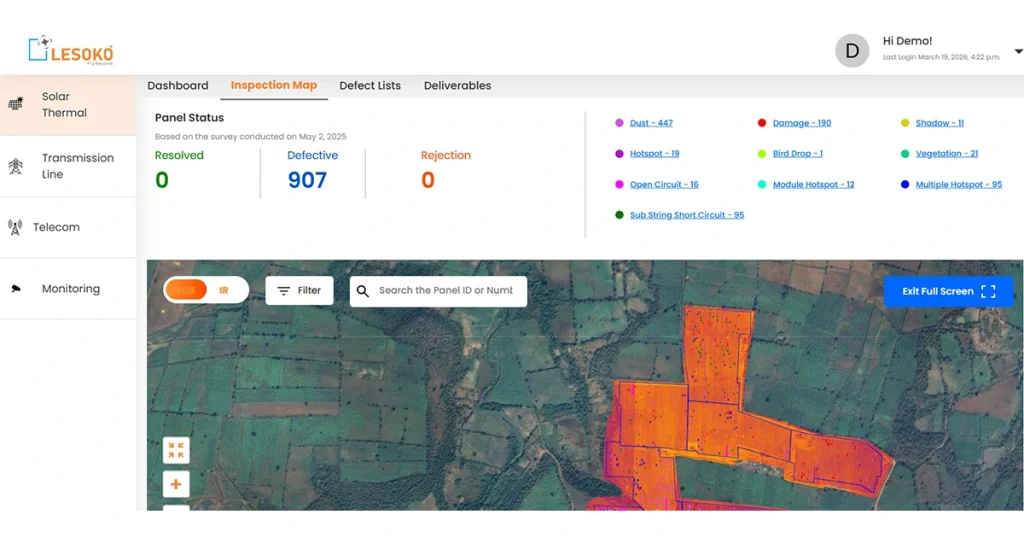 Lesoko solar inspection map view showing 907 defective panels across a solar farm with color-coded defect markers overlaid on an aerial RGB/IR satellite image