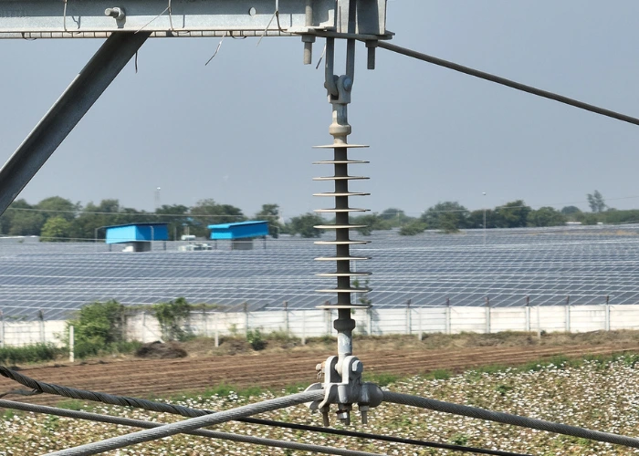 Thermal imaging showing Severity Level 5 hotspot in 33kV jumper connection during transmission line inspection — high-resistance joint overheating detected via infrared camera