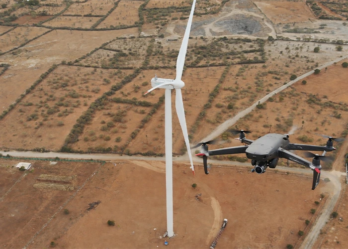 DGCA-certified drone conducting a close-range UAV survey of a wind turbine in Tamil Nadu, India