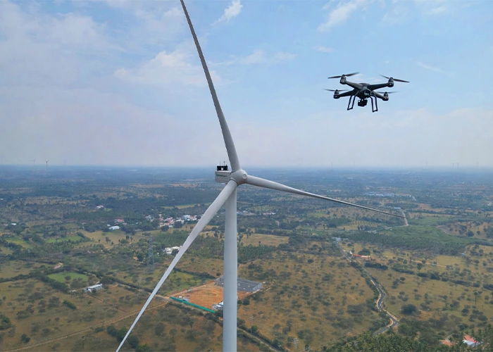 DGCA-certified UAV conducting wind turbine blade inspection in India — 4K visual and thermal drone footage by Lesoko