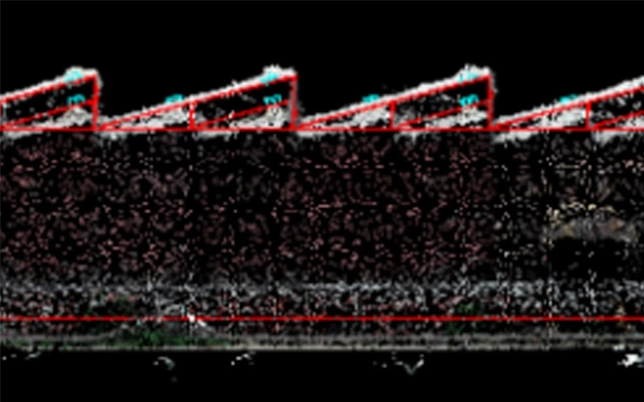 Point cloud cross-section of sawtooth industrial roof showing structural ridge profile with red boundary annotations