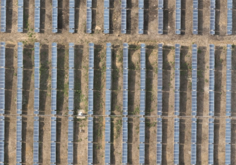 Aerial RGB drone image of solar panel rows captured during survey flight